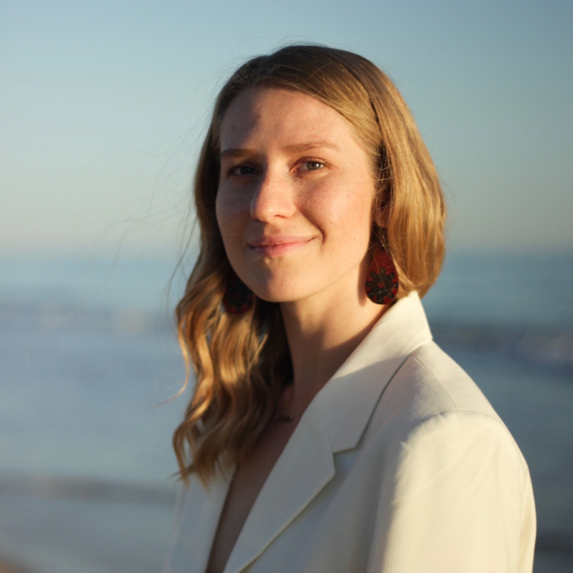 Maryna Machado portrait by the ocean